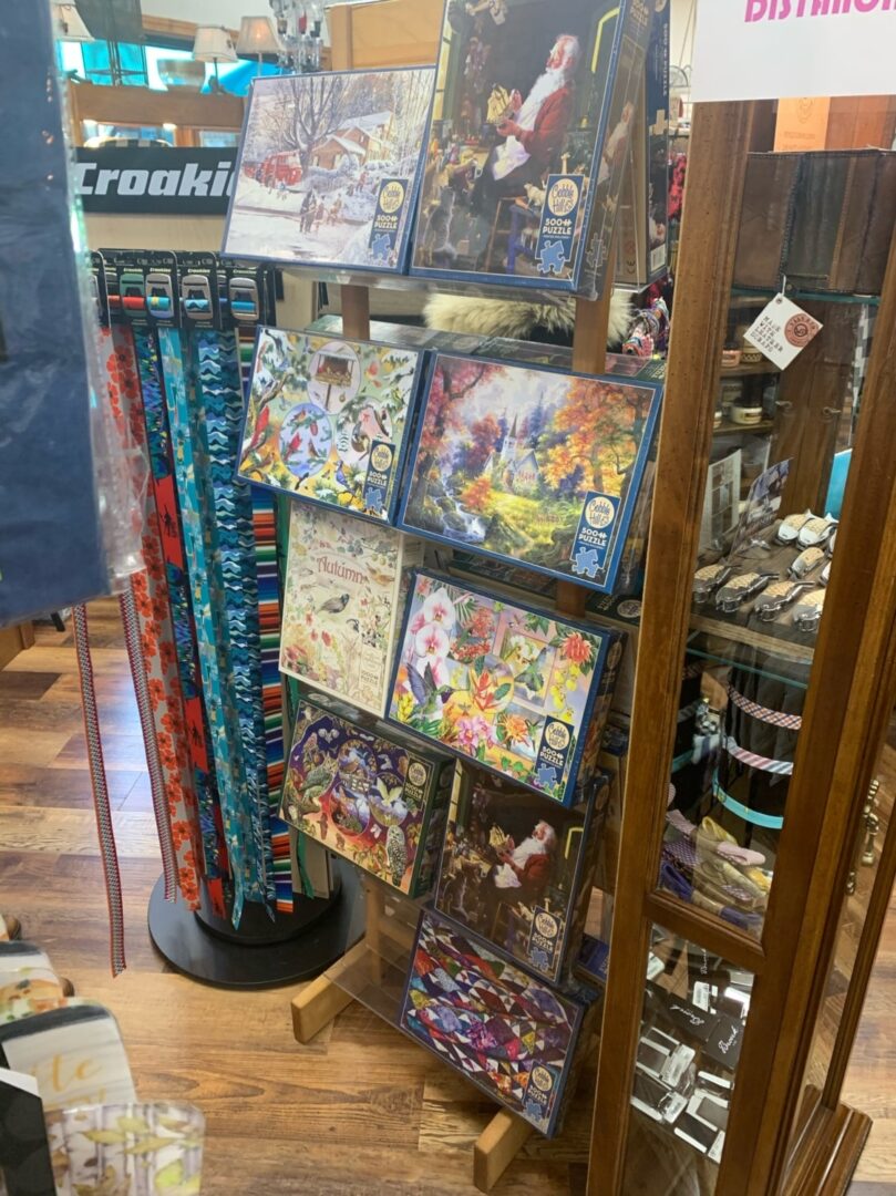 Puzzles displayed on a rack